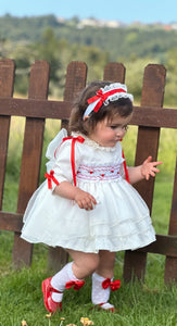 In25-21 Smocked dress in
organza