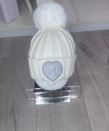 W251909 MALLORY
Pom pom knitted hat - SNOW WHITE